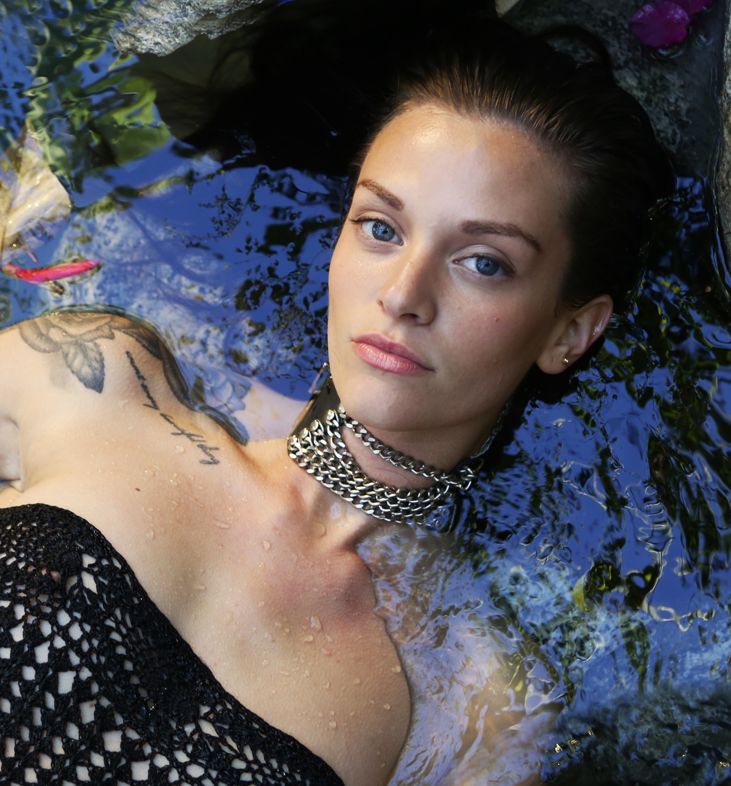 beauty under water fashion shoot wet hair pool tropical